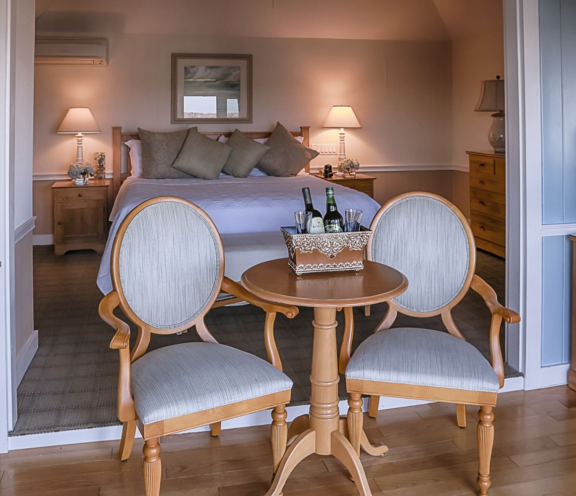 suite, 1 bedroom, ocean view | living area | 50-inch led tv with digital channels, tv, ipod dock