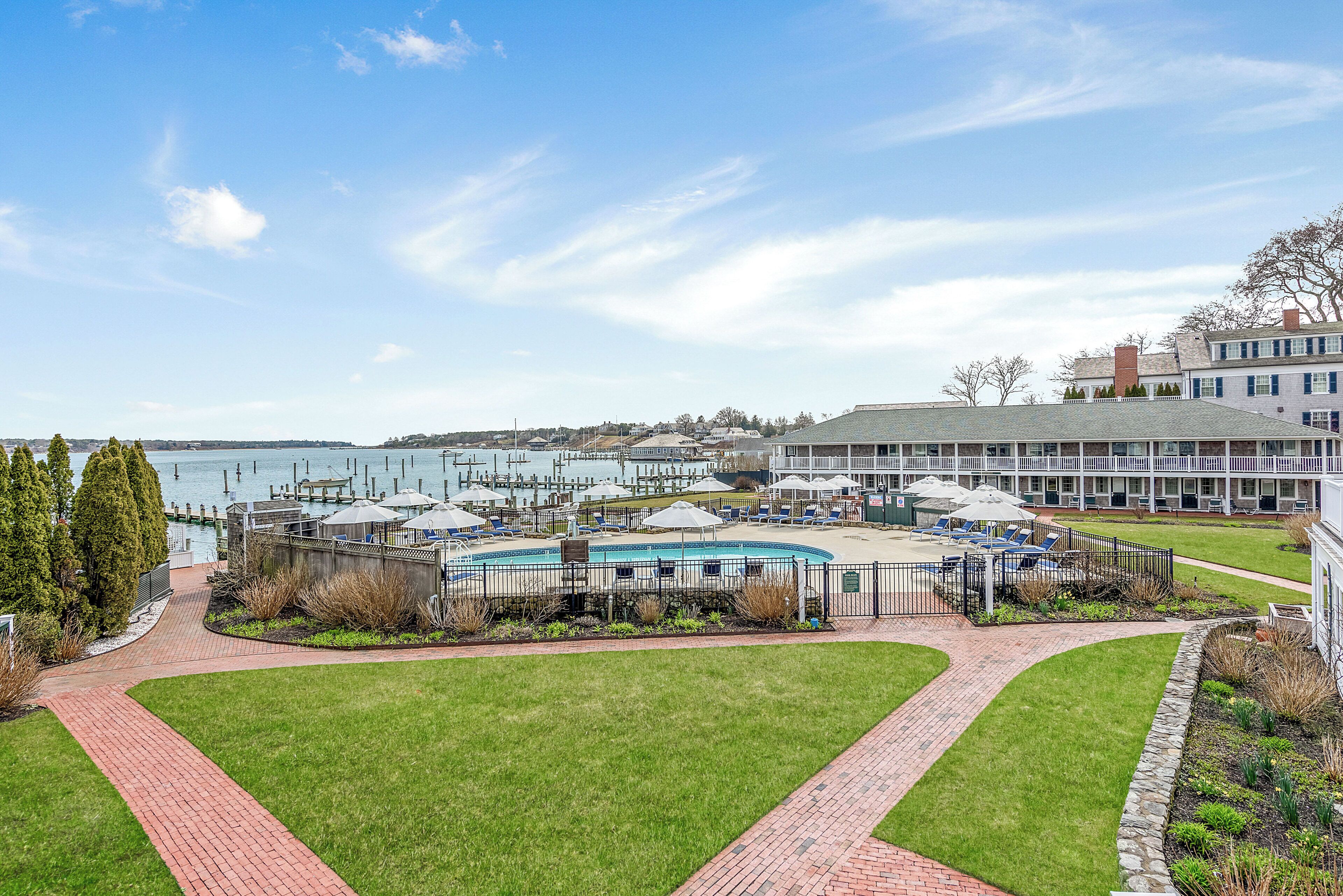 seasonal outdoor pool, open 8:00 am to 7:30 pm, pool umbrellas