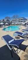 Seasonal outdoor pool, open 8:00 AM to 7:30 PM, pool umbrellas