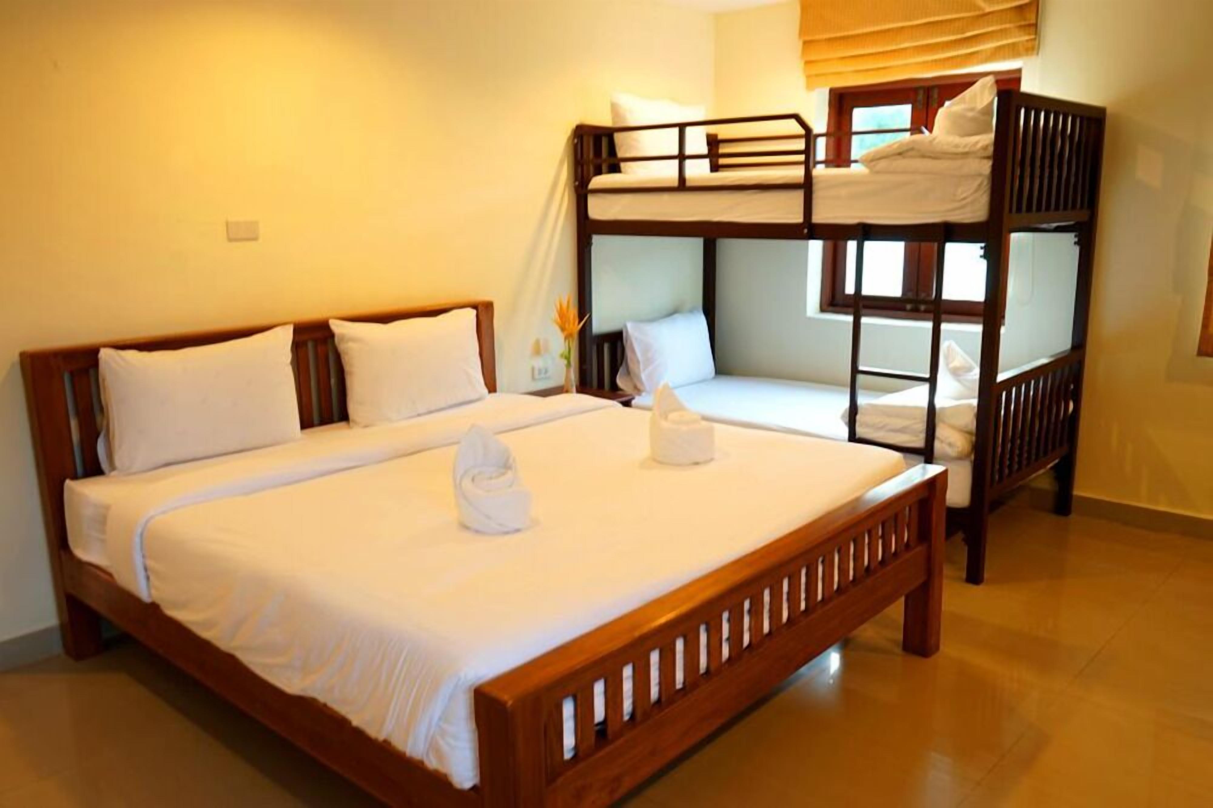 family room | premium bedding, select comfort beds, in-room safe