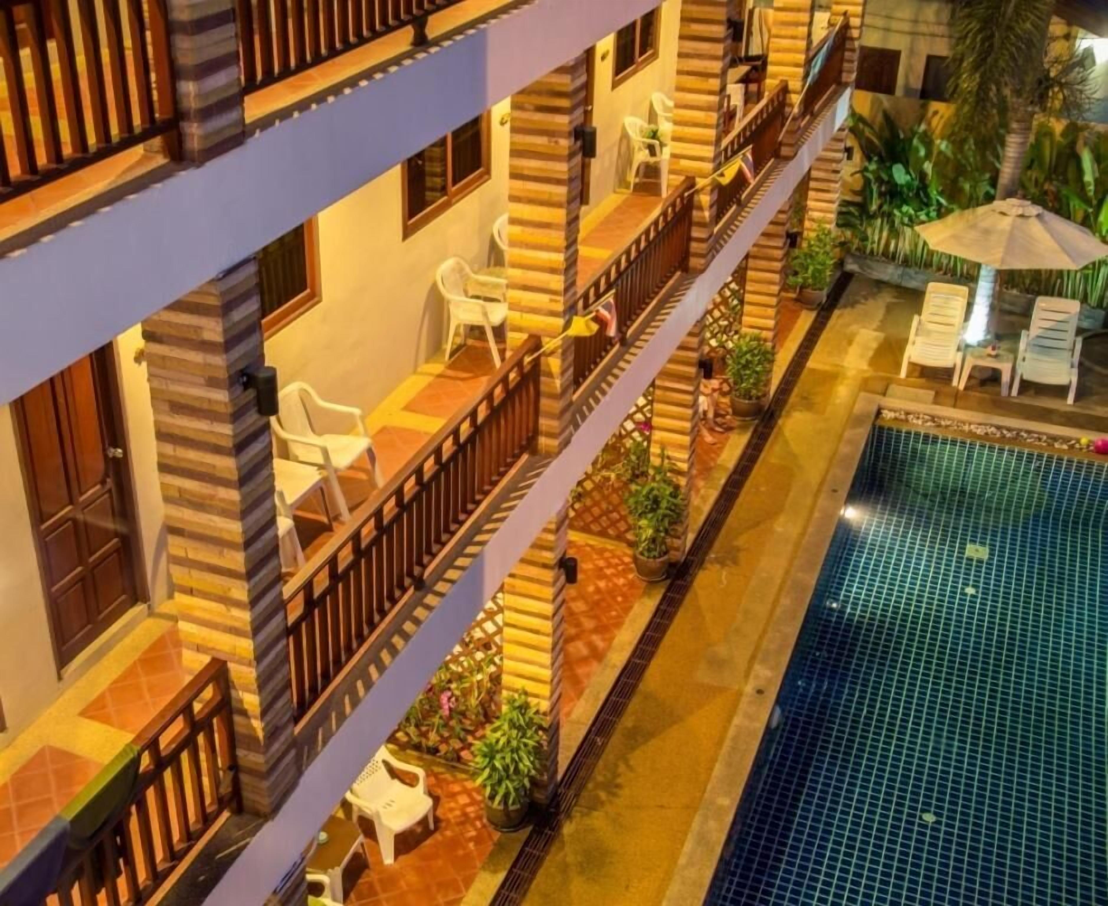 outdoor pool, open 8:00 am to 8:00 pm, pool umbrellas, pool loungers