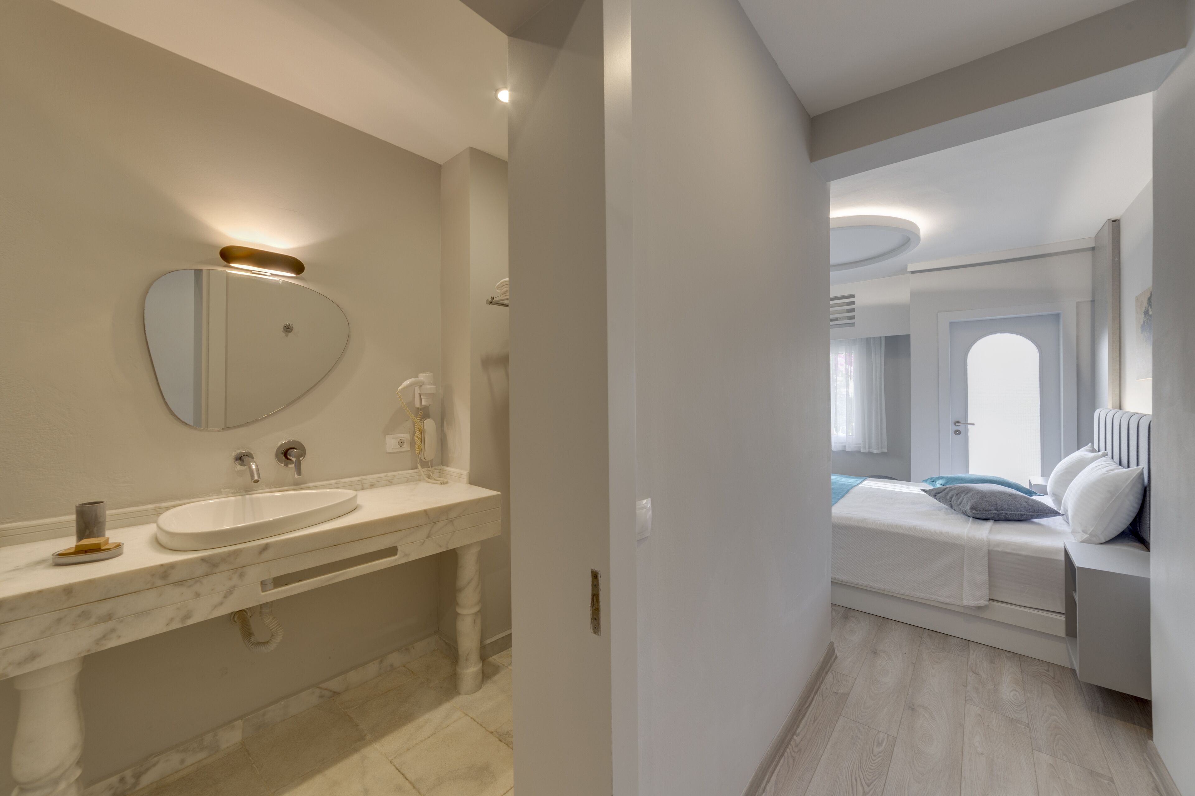family suite | bathroom | shower, rainfall showerhead, hair dryer, slippers