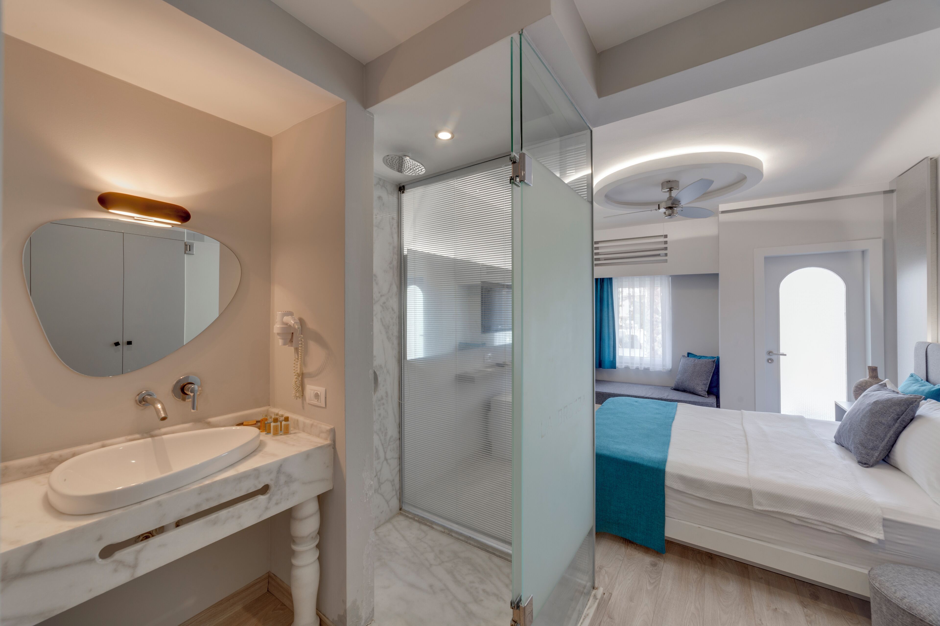 shower, rainfall showerhead, hair dryer, slippers