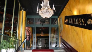 A staircase leading to a room labeled "TAILORS." - Statt Kristinehamn (Kristinehamn)