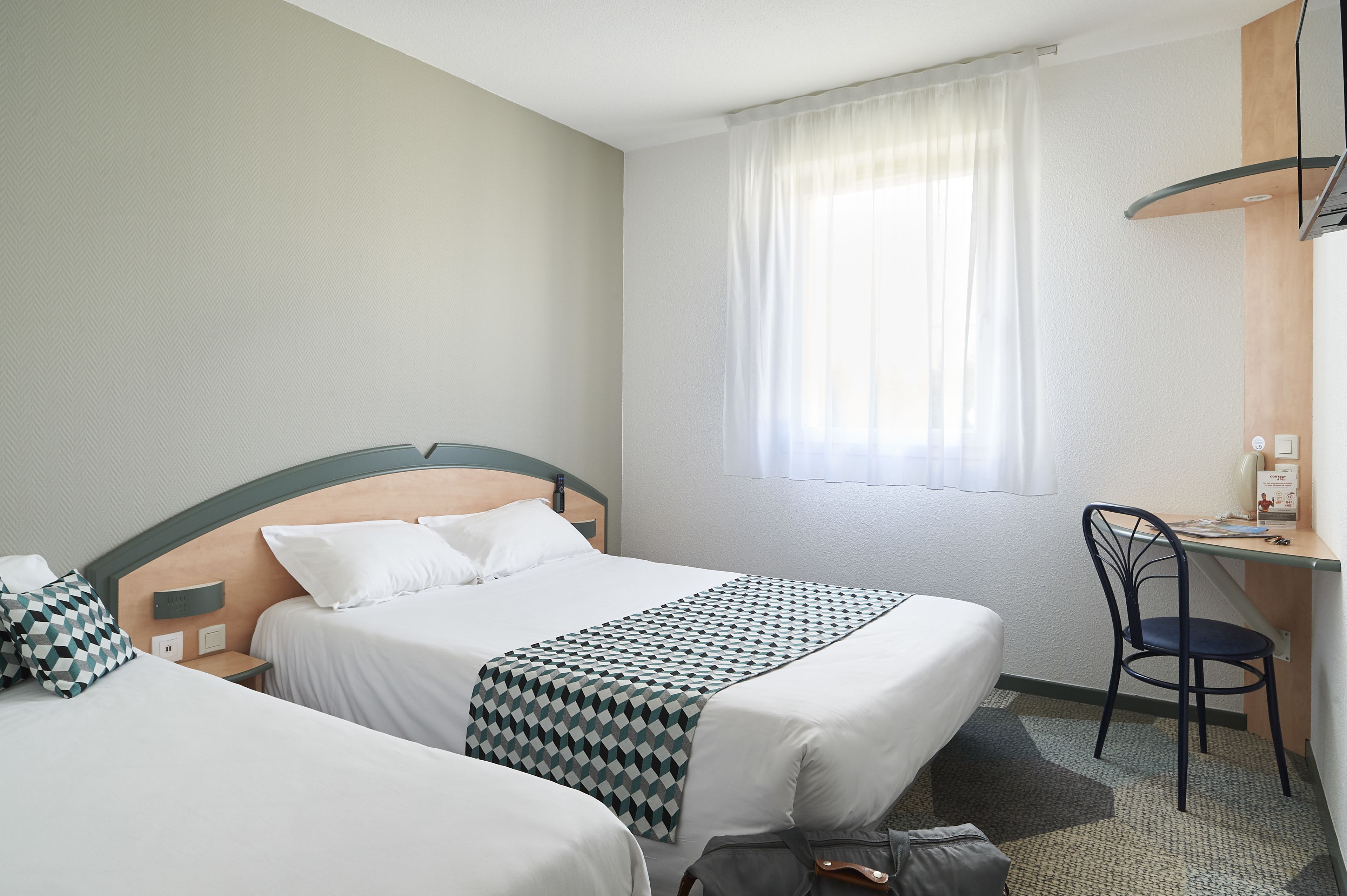 classic triple room | desk, laptop workspace, blackout curtains, soundproofing