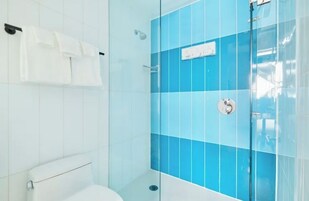 Designer toiletries, hair dryer, towels, soap