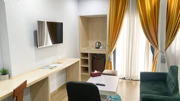 Ropa de cama de alta calidad y minibar
