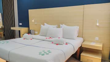 Ropa de cama de alta calidad y minibar