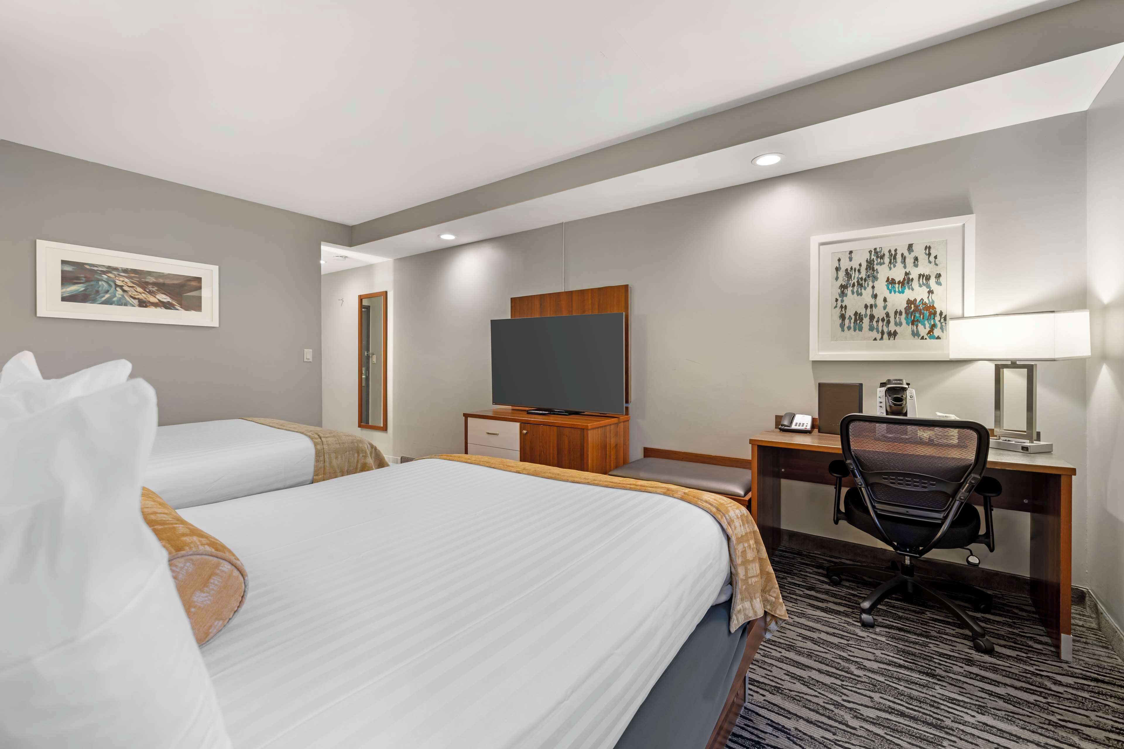 standard room, 2 queen beds, non smoking (walk-in shower) | desk, laptop workspace, blackout curtains, iron/ironing board