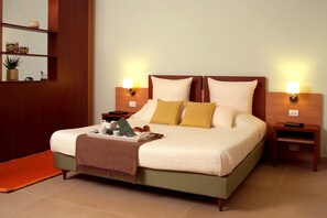 Suite – executive | Italienske Frette-laken, minibar, safe på rommet og individuelt dekorert