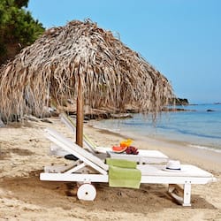 On the beach, beach shuttle, sun loungers, beach umbrellas