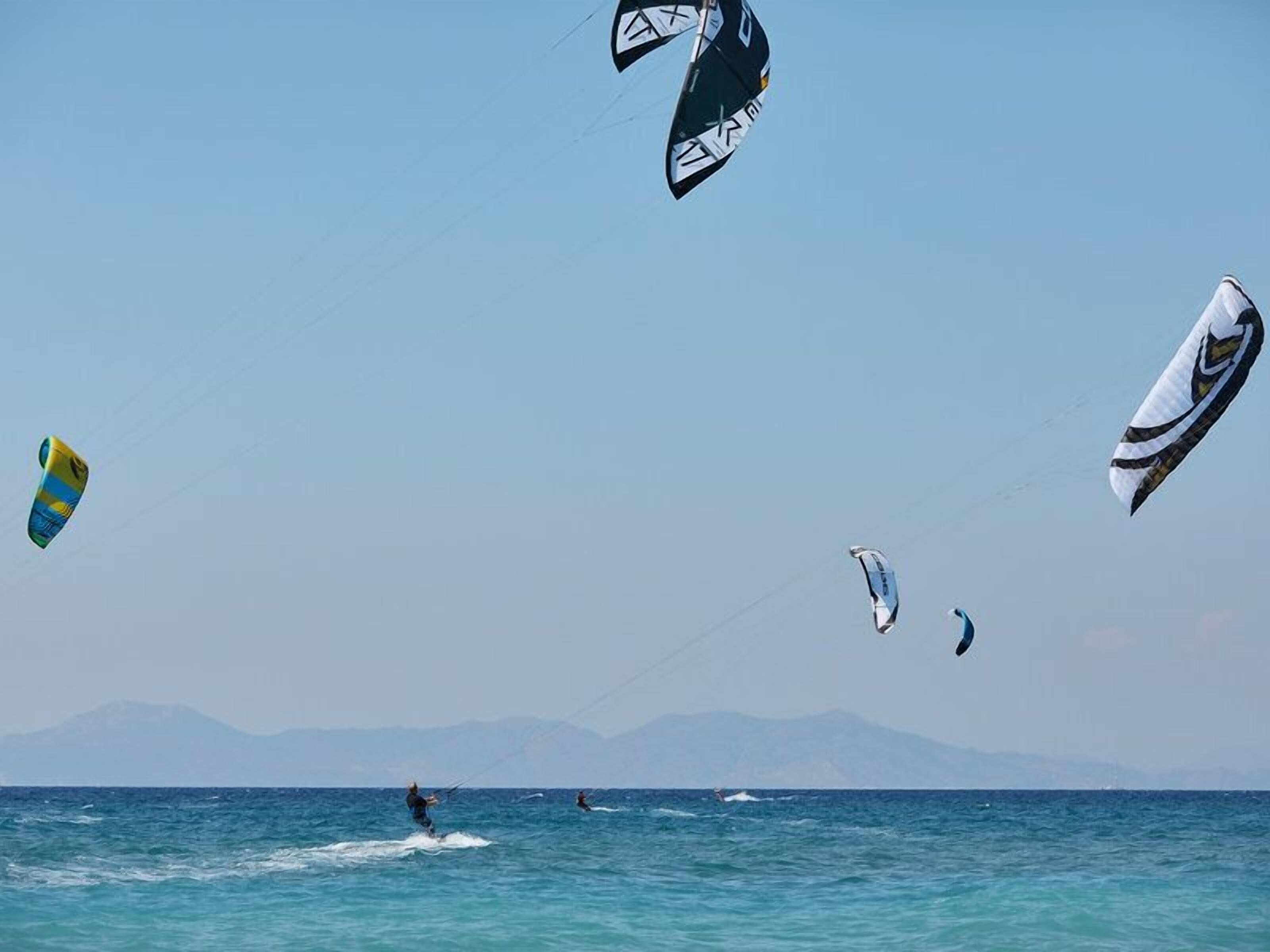 on the beach, sun-loungers, beach umbrellas, beach towels