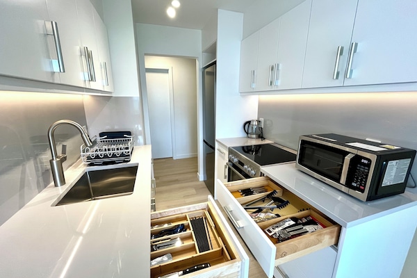 Premium Suite, 1 Bedroom | Private kitchen | Coffee/tea maker, full-size fridge, microwave, oven