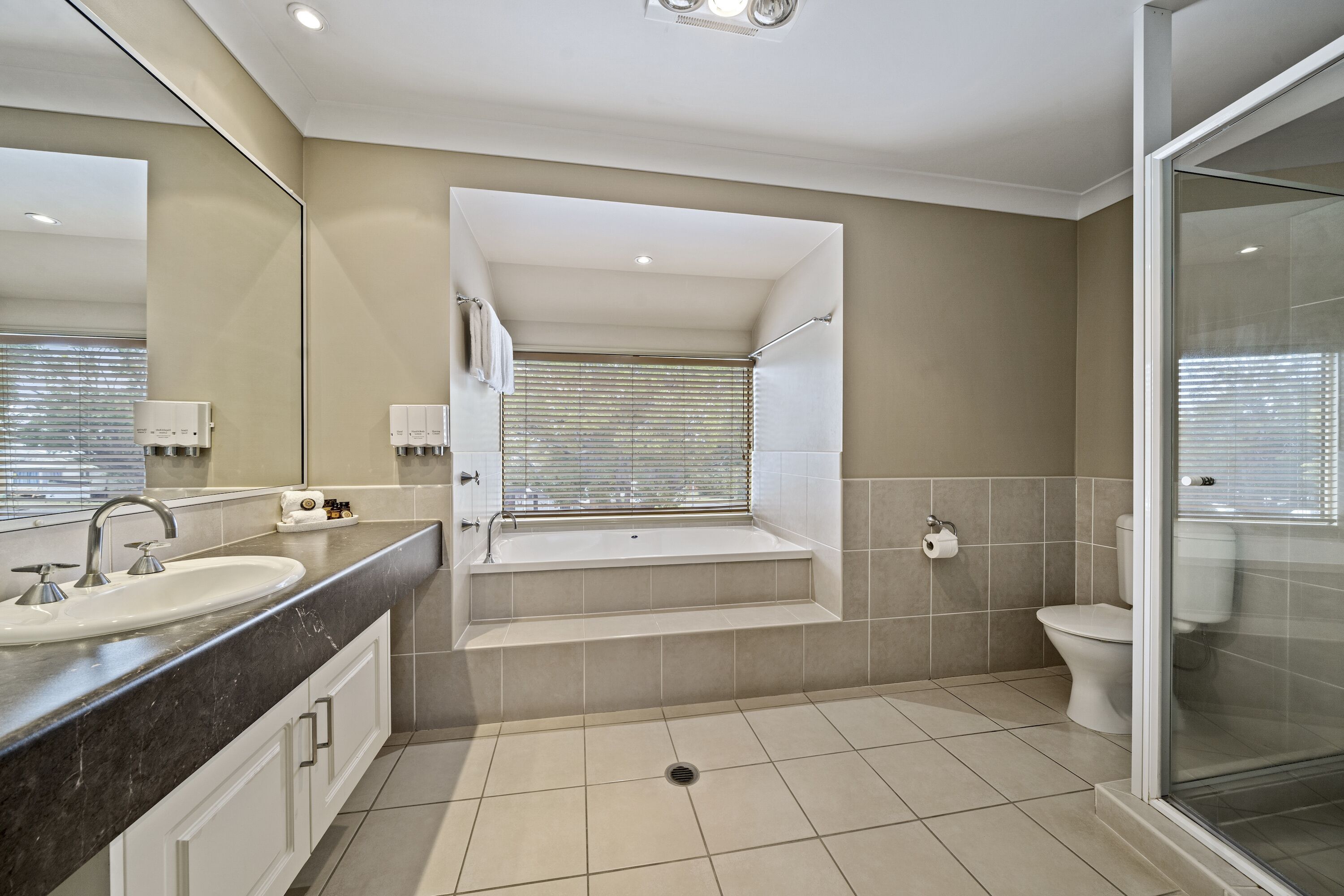 king spa suite | bathroom | free toiletries, hair dryer, towels, soap