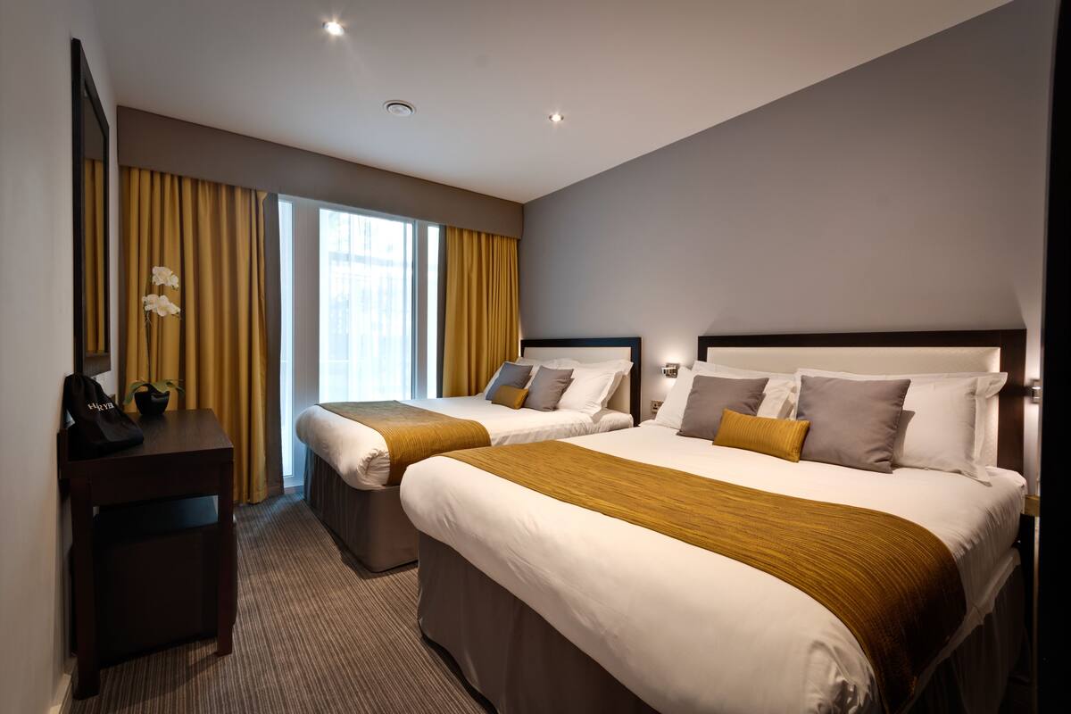 Premium bedding, memory-foam beds, desk, blackout curtains