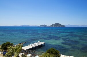 Private beach, sun loungers, beach umbrellas