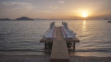 Private beach, sun loungers, beach umbrellas