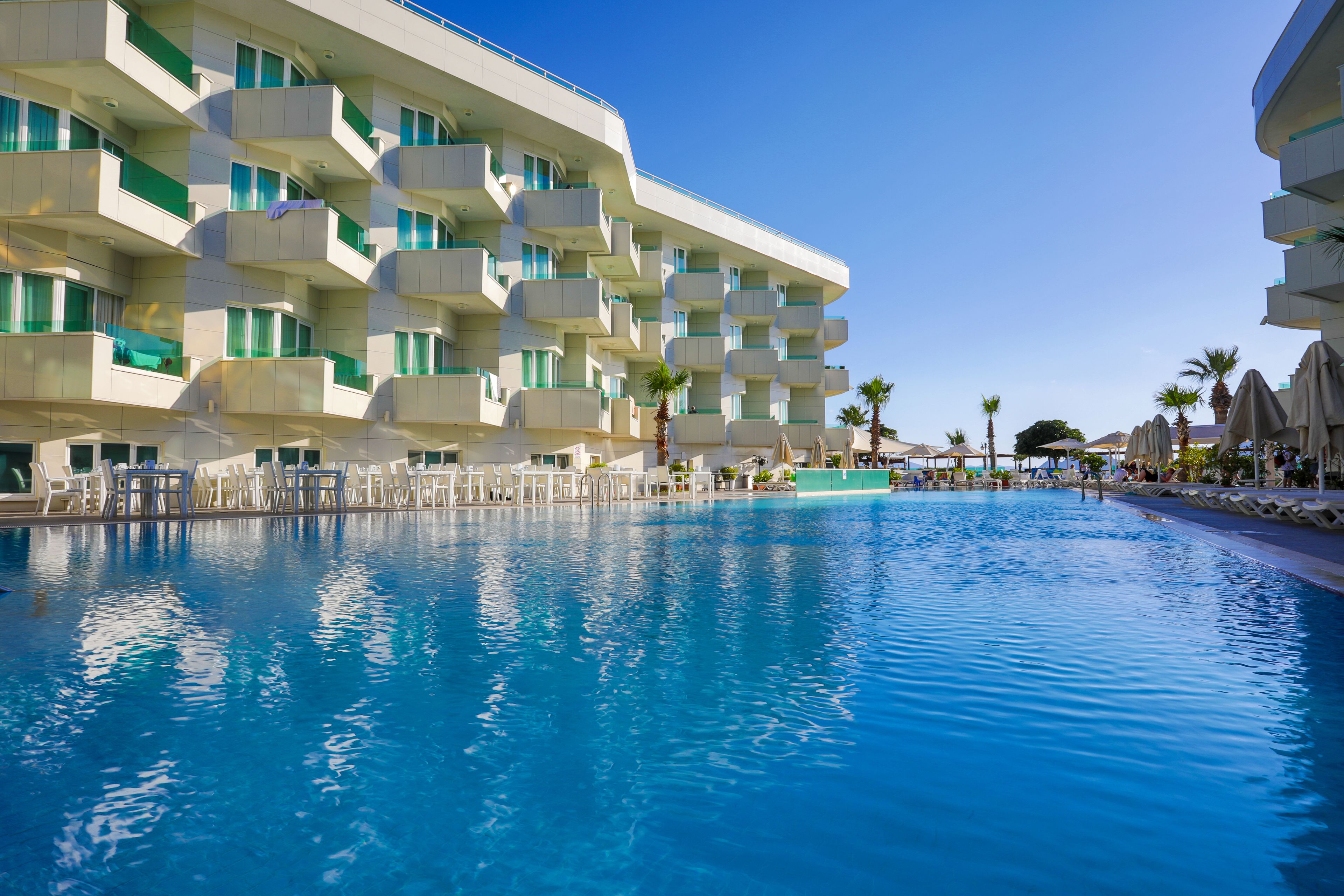 Outdoor pool, pool umbrellas, pool loungers