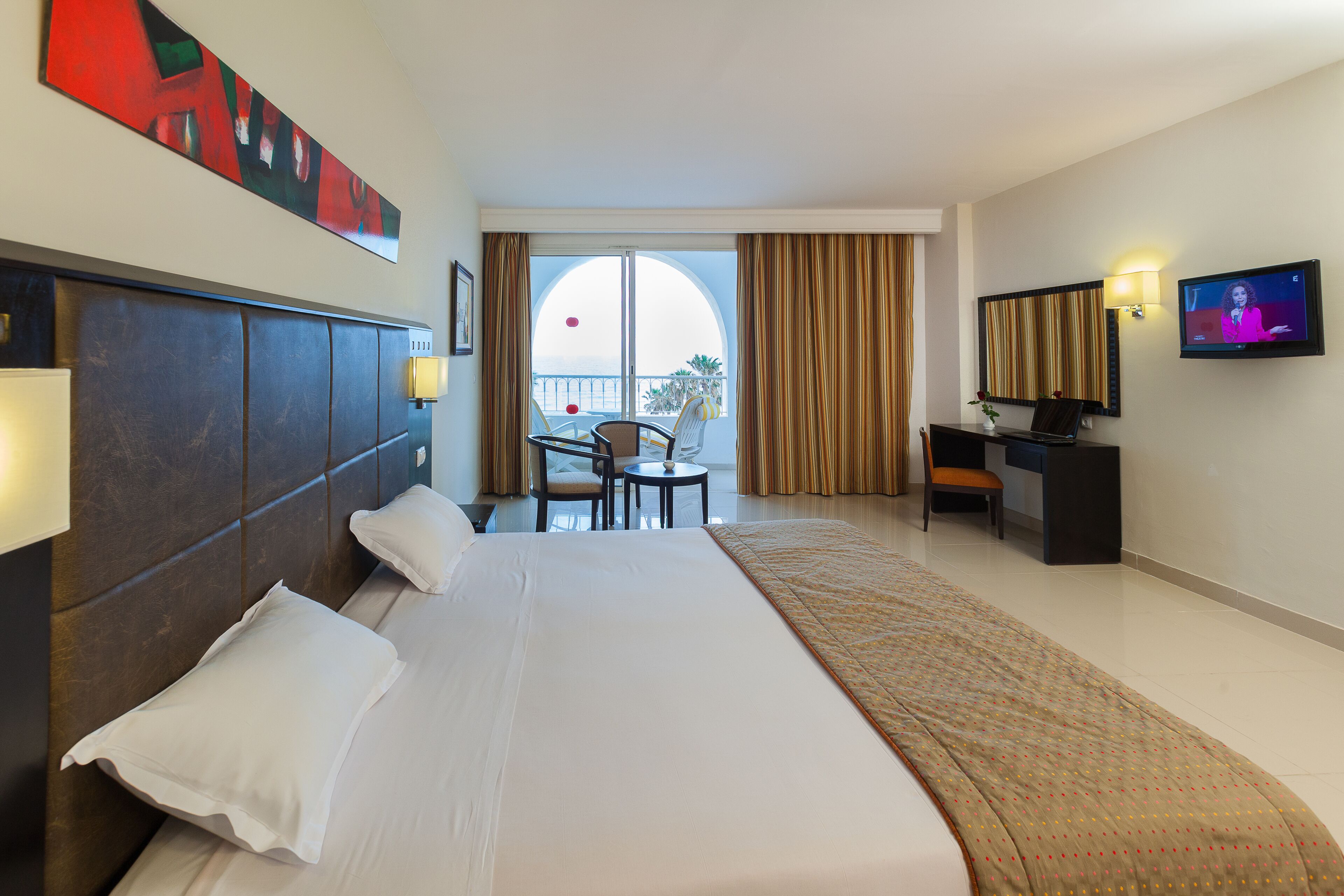 single room, garden view | minibar, in-room safe, desk, blackout curtains