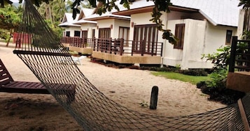 Villa, frente a la playa | Minibar, caja fuerte, escritorio y cunas gratuitas