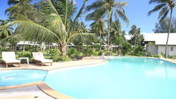 Outdoor pool, pool umbrellas, sun loungers