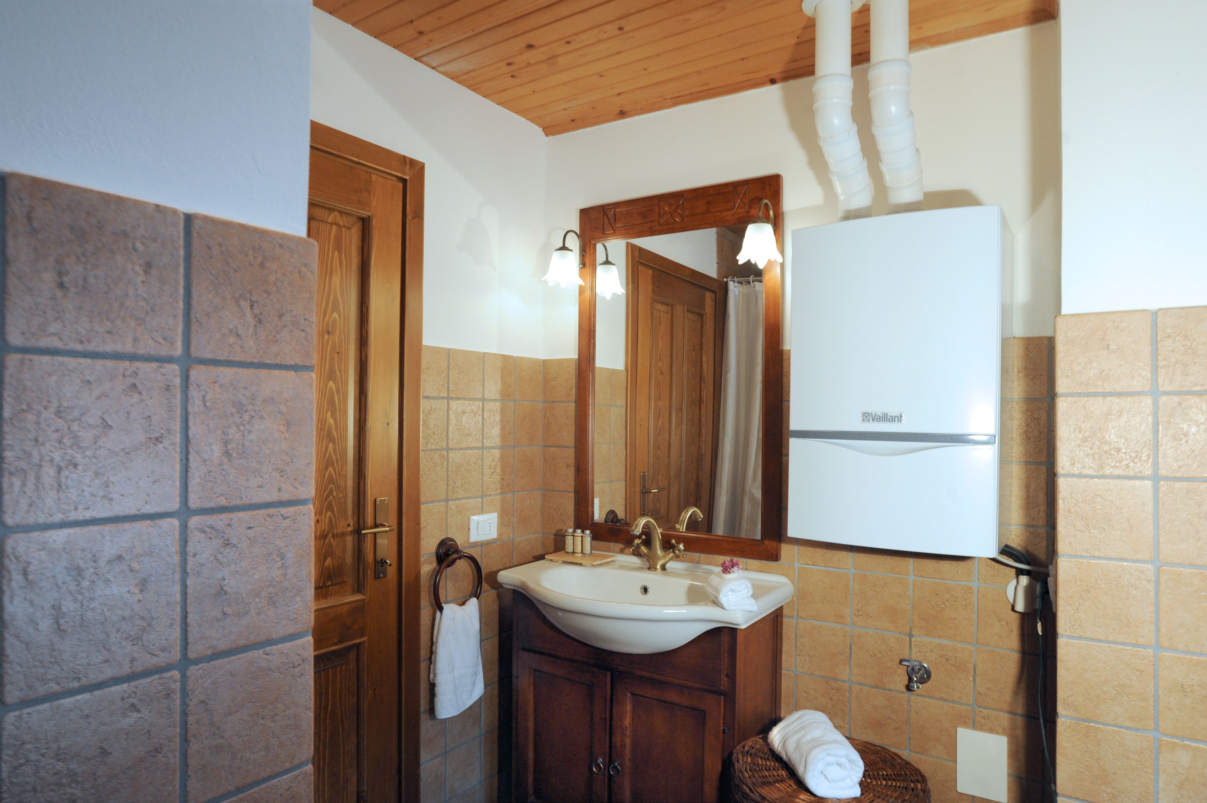 house (tualis) | bathroom | hair dryer, towels