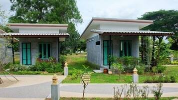 Two small, single-story buildings with a flat roof and a simple, rectangular design.