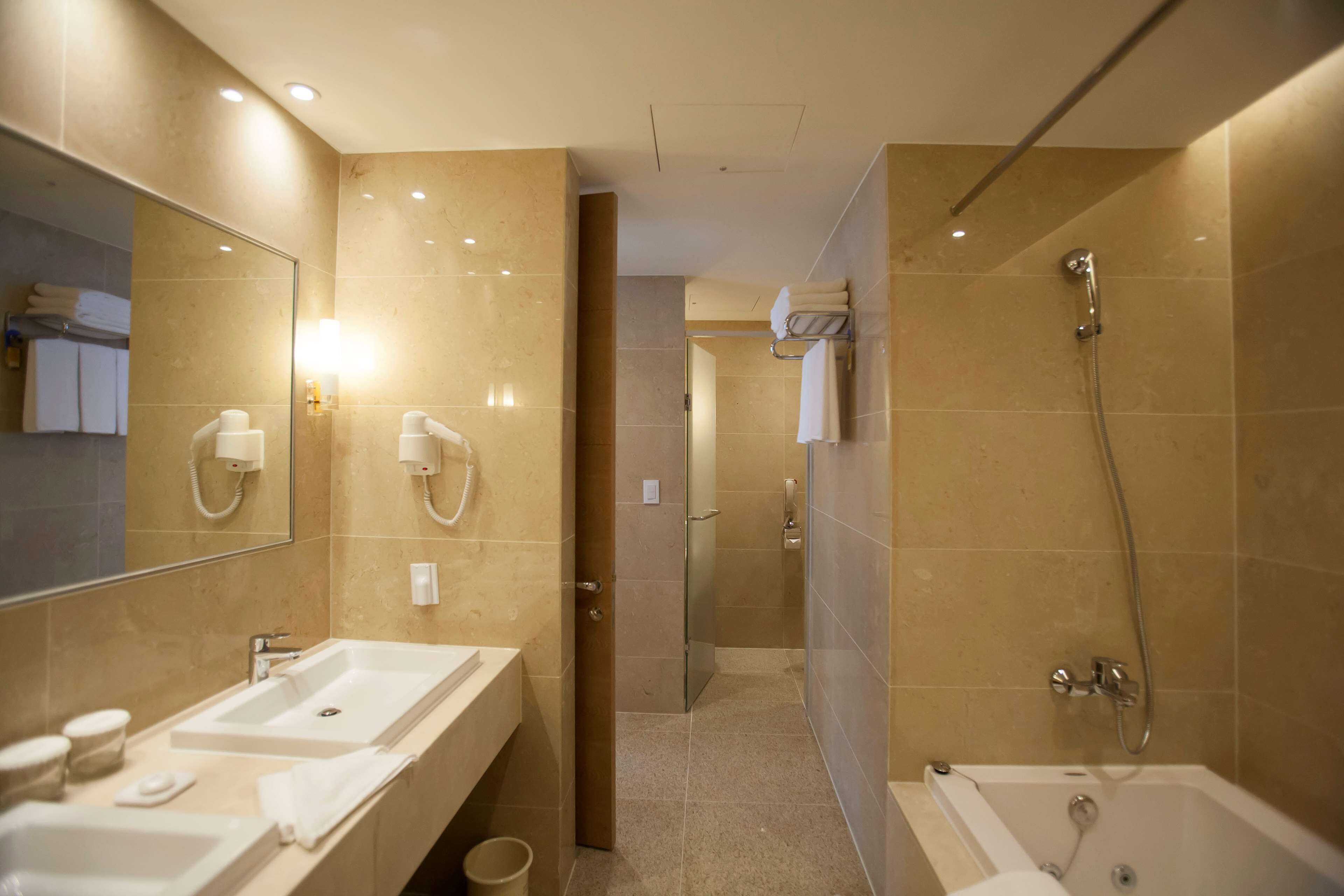 hair dryer, bathrobes, slippers, bidet