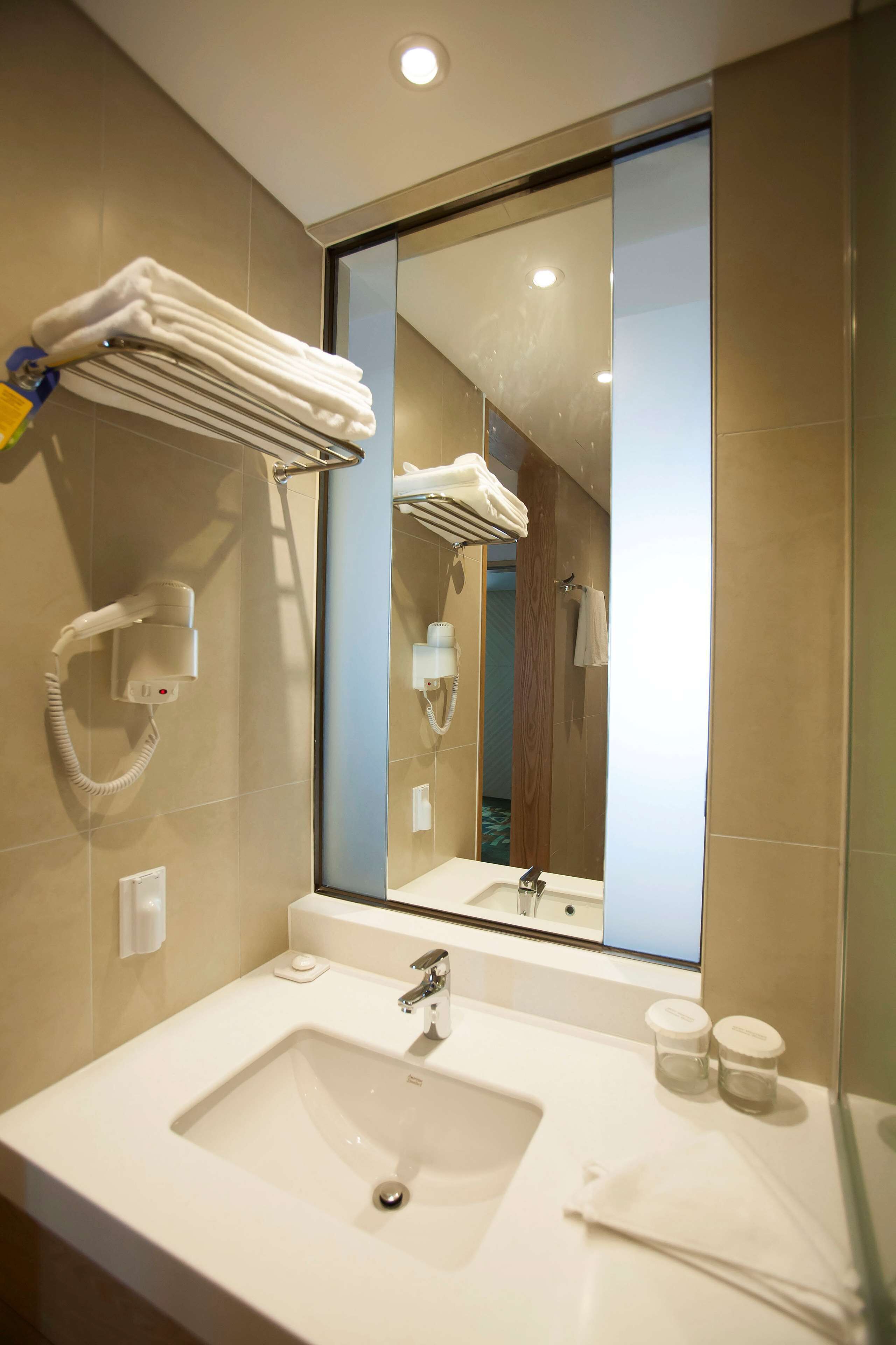 hair dryer, bathrobes, slippers, bidet