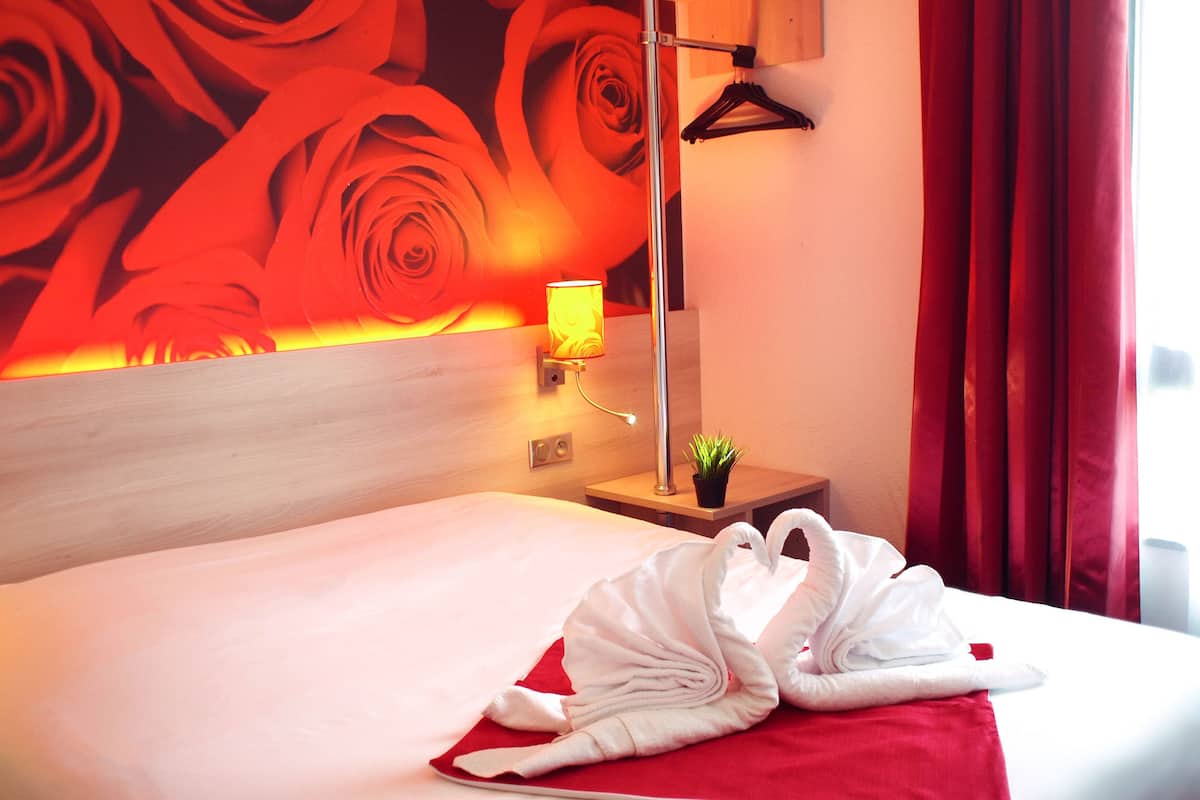Blackout drapes, iron/ironing board, free WiFi, bed sheets