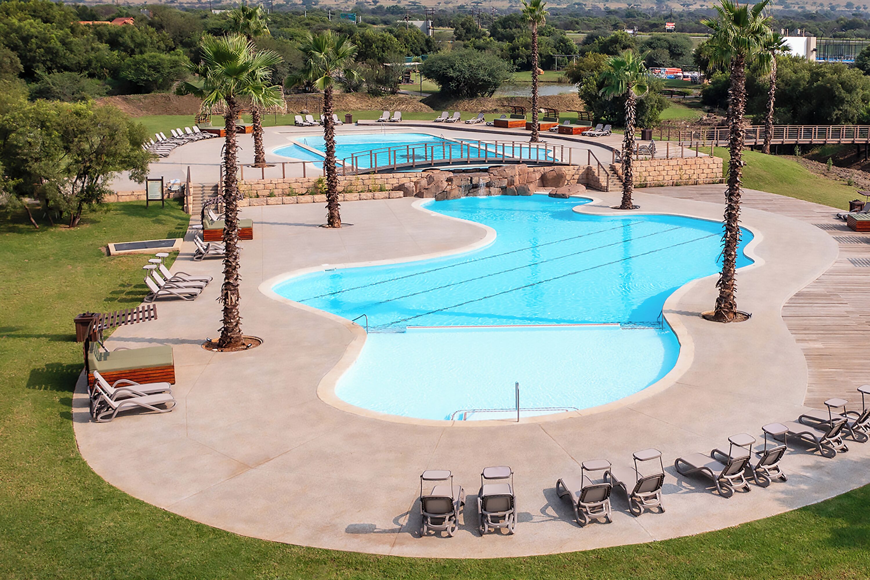 Outdoor pool, pool umbrellas, sun loungers
