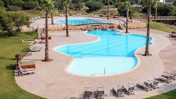 Outdoor pool, pool umbrellas, sun loungers