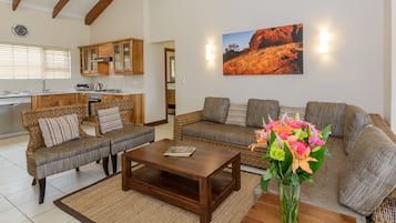 Two Bedroom Chalet | Living room | Flat-screen TV