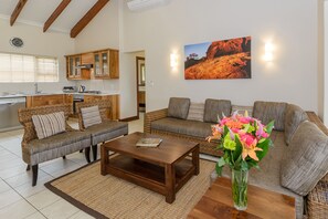 Two Bedroom Chalet | Living room | Flat-screen TV
