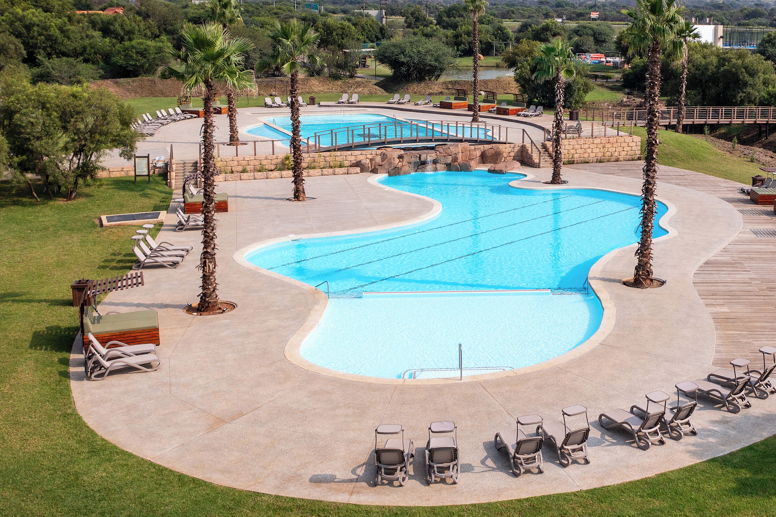 Outdoor pool, pool umbrellas, sun loungers