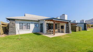 Chalet, 2 slaapkamers | Uitzicht op de tuin