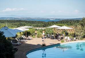 Outdoor pool, a rooftop pool, open 8:00 AM to 7:00 PM, sun loungers