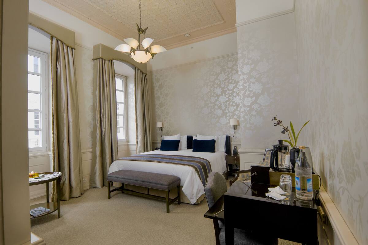 Deluxe Room, 1 King Bed | Premium bedding, pillowtop beds, in-room safe, desk