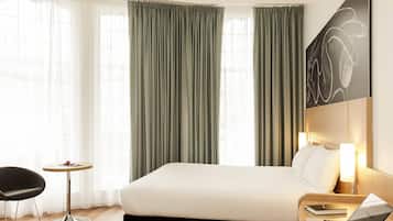 Wifi gratis, ropa de cama y despertador