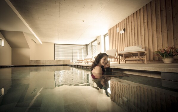 Indoor pool, open 3:00 PM to 8:00 PM, pool loungers