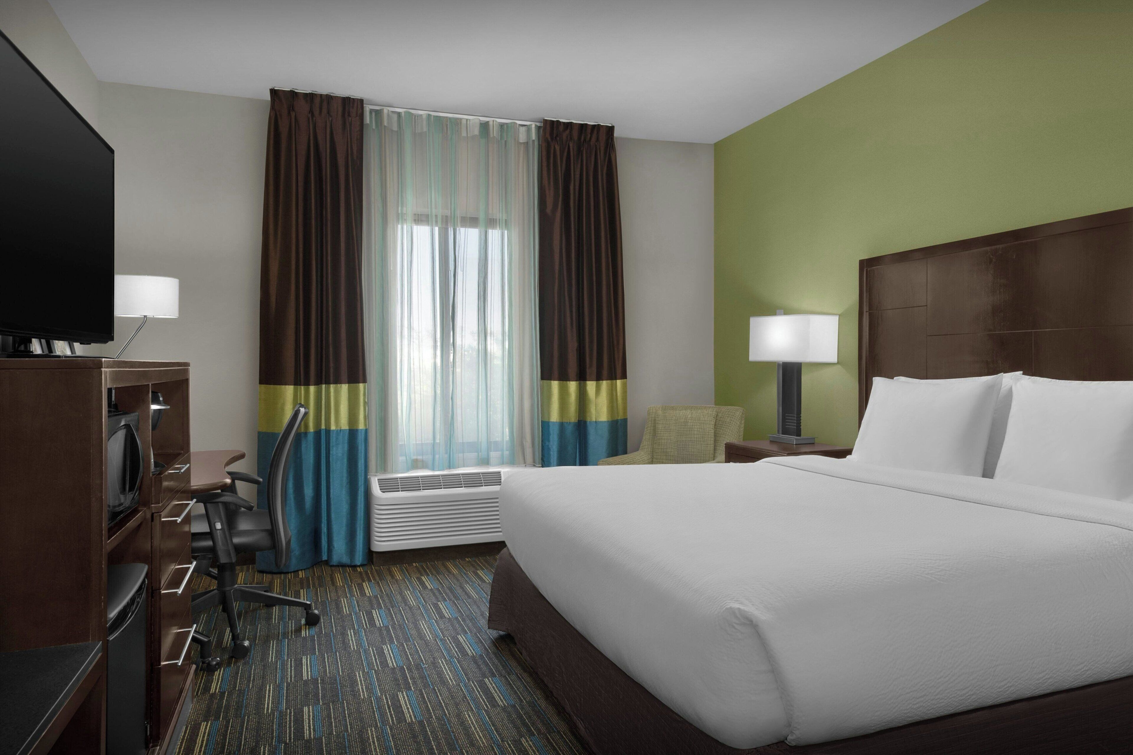 Room, 1 King Bed | Desk, laptop workspace, blackout drapes, iron/ironing board