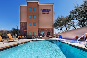 Outdoor pool, open 9:00 AM to 8:00 PM, pool loungers