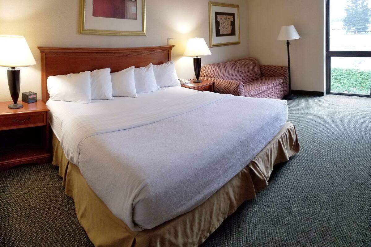 Pillowtop beds, desk, blackout drapes, iron/ironing board