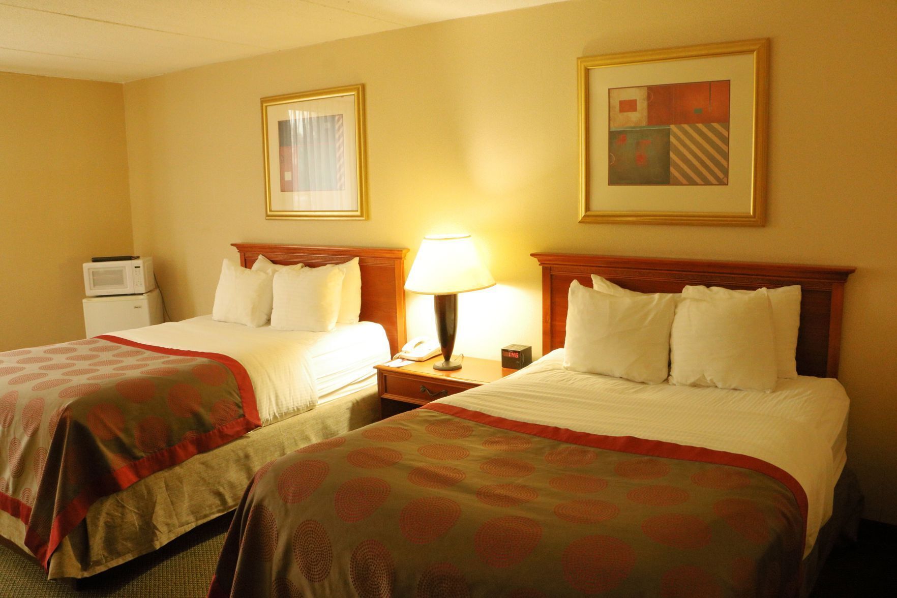 Pillowtop beds, desk, blackout drapes, iron/ironing board