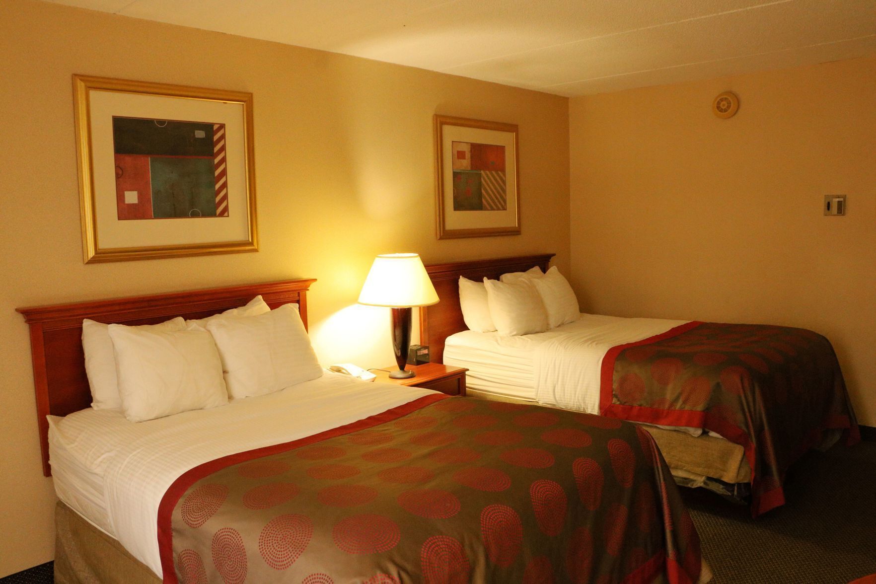 Pillowtop beds, desk, blackout drapes, iron/ironing board