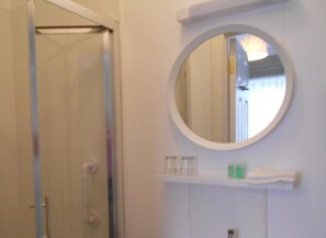 Shower, free toiletries, hair dryer, towels