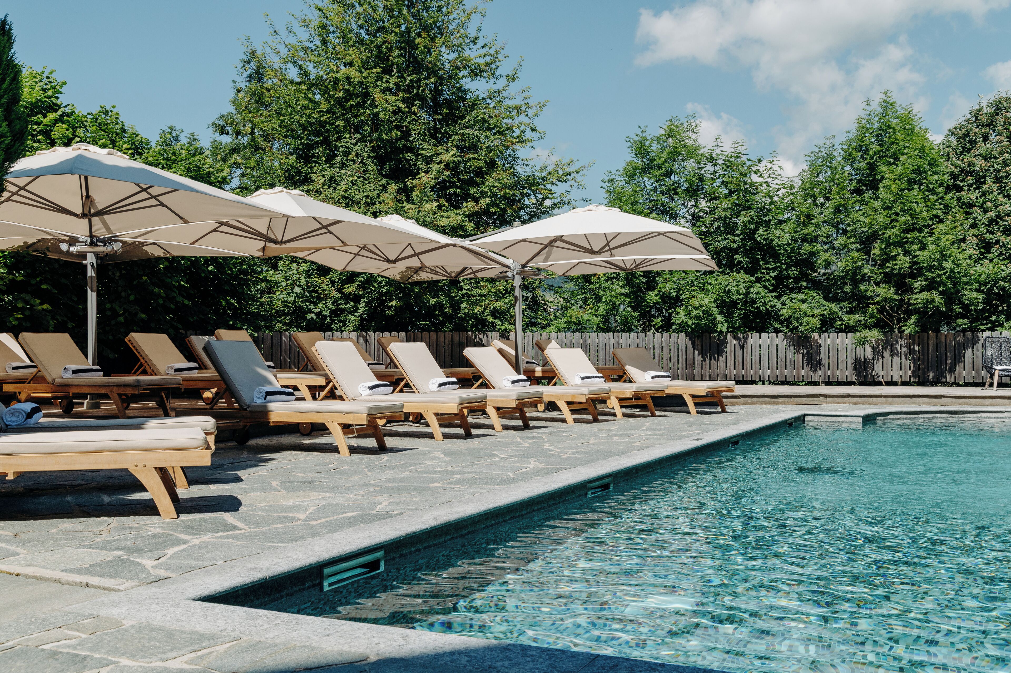 Indoor pool, outdoor pool, open 8:00 AM to 8:00 PM, pool umbrellas