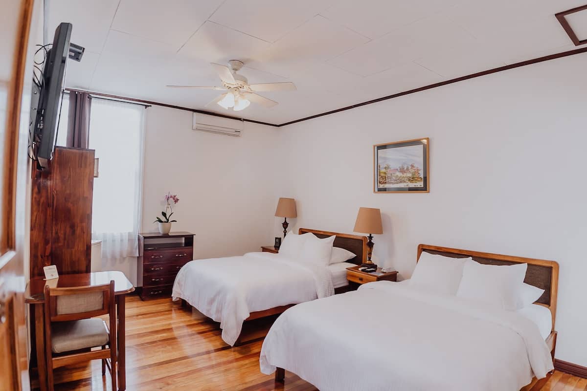 Deluxe Double Room, 2 Double Beds | 1 bedroom, in-room safe, desk, free WiFi