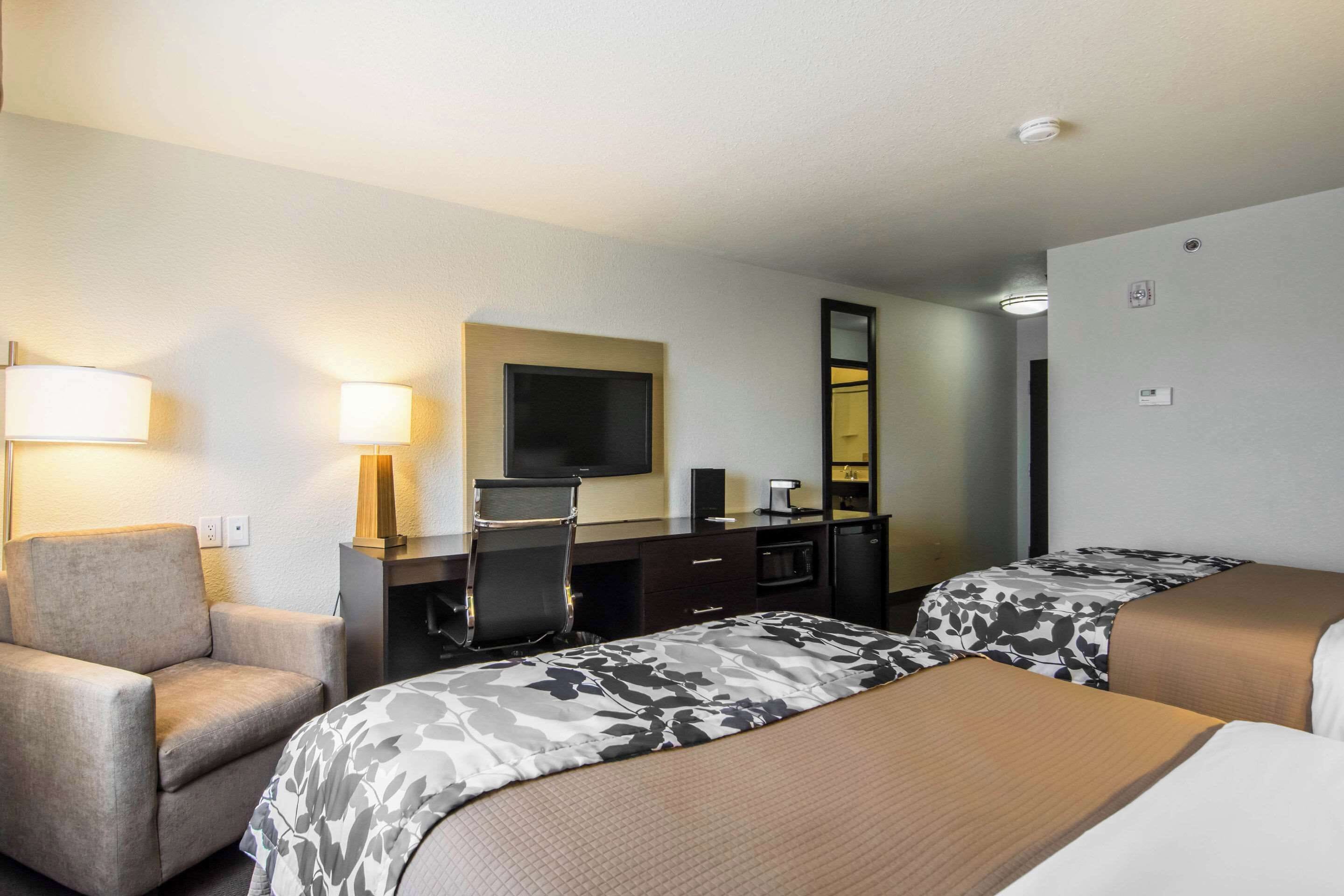 pillow-top beds, desk, blackout curtains, iron/ironing board