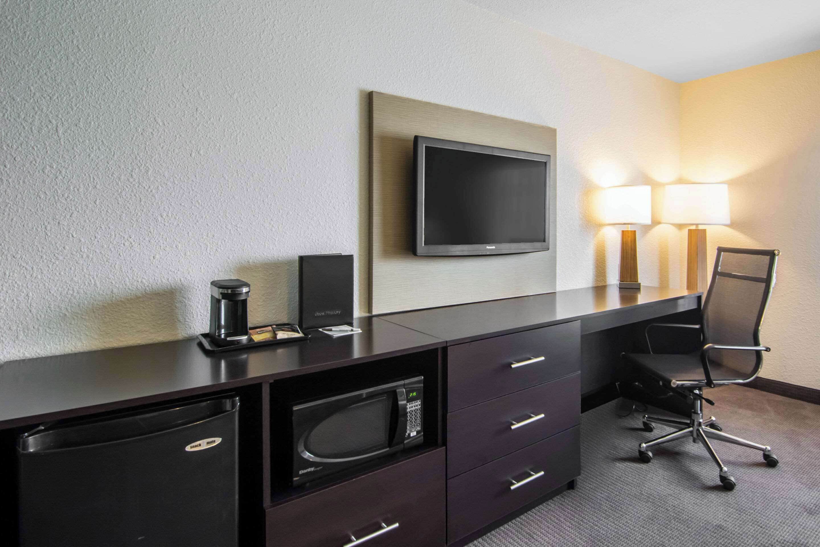 pillow-top beds, desk, blackout curtains, iron/ironing board